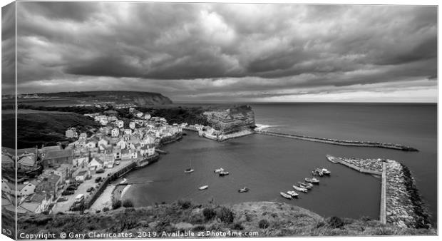 Dramatic Skies at Staithes Canvas Print by Gary Clarricoates