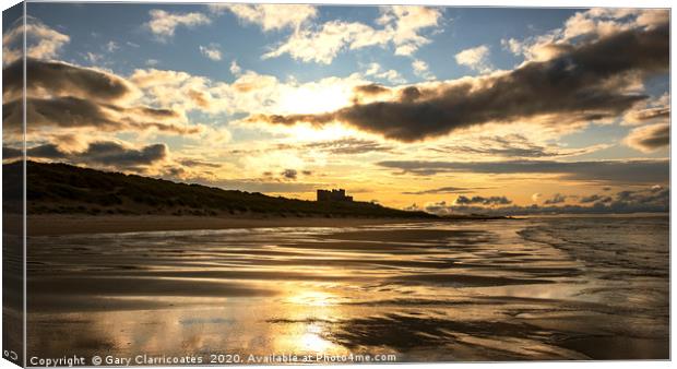 Receding Tide at Bamburgh Canvas Print by Gary Clarricoates