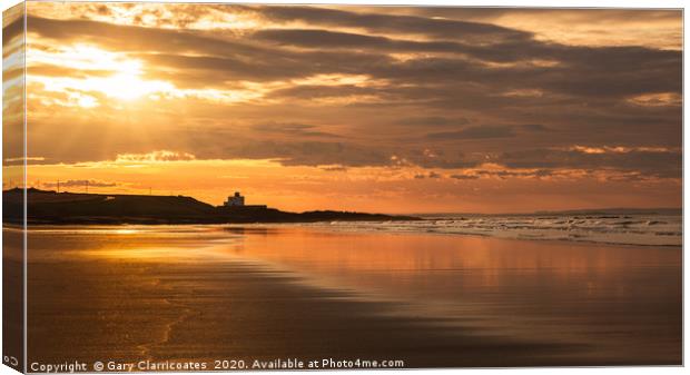 Bamburgh Lighthouse at Sunset Canvas Print by Gary Clarricoates