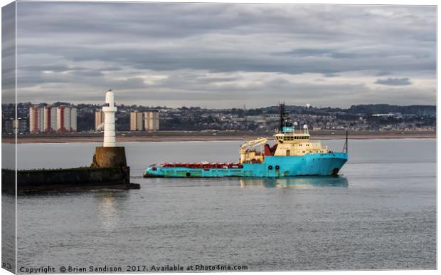 Oil Supply boat leaving Aberdeen Harbour Canvas Print by Brian Sandison