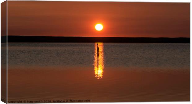 A sunset over a body of water Canvas Print by tony smith