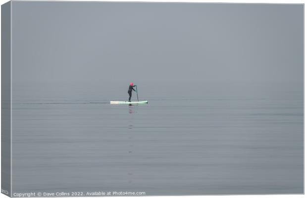 A woman on a paddle board in still waters in the mist of the Firth of Forth, Edinburgh, Scotland Canvas Print by Dave Collins