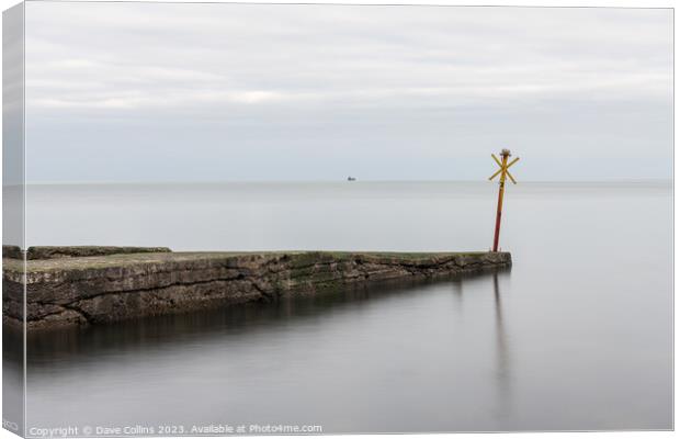 Long Exposure of a pier and peir marker in Dun Laoghaire, Ireland Canvas Print by Dave Collins