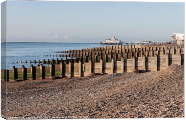 Eastbourne Pier and Beach with a clear blue sky and calm seas, Eastbourne, England Canvas Print by Dave Collins