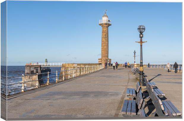 West Pier harbour lighthouse from the west pier, Whitby, Yorkshire, England Canvas Print by Dave Collins
