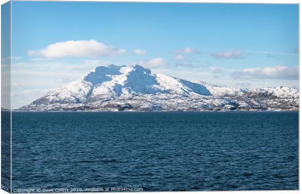 Snow covered hills on the Norwegian Coast in winter Canvas Print by Dave Collins