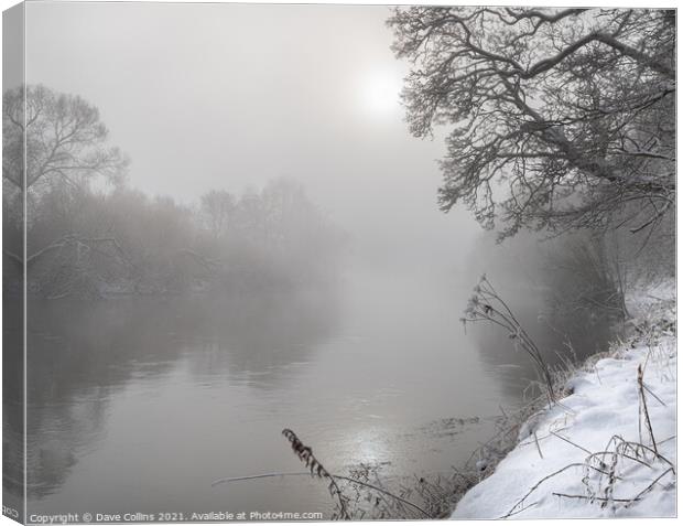 Sun breaking through the mist over the Teviot River in winter snow in the Scottish Borders Canvas Print by Dave Collins