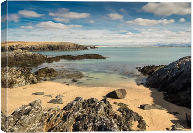 Snow-capped serenity in Rhoscolyn Cove. Canvas Print by Colin Allen