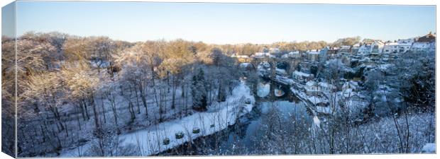 Winter snow sunrise over the river Nidd in Knaresborough, North Yorkshire. Panoramic format. Canvas Print by mike morley