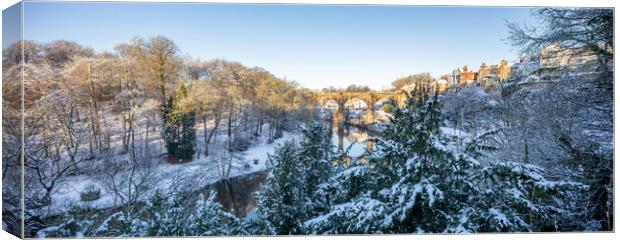 Winter snow sunrise over the river Nidd in Knaresborough, North Yorkshire. Panoramic format. Canvas Print by mike morley