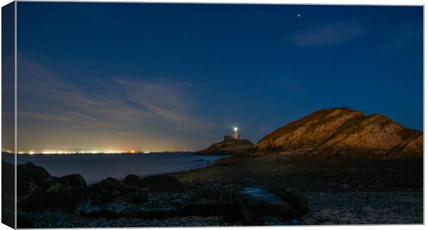 Mumbles lighthouse under the stars Canvas Print by Bryn Morgan