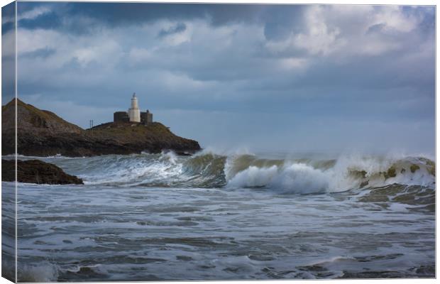 Mumbles lighthouse the wave. Canvas Print by Bryn Morgan