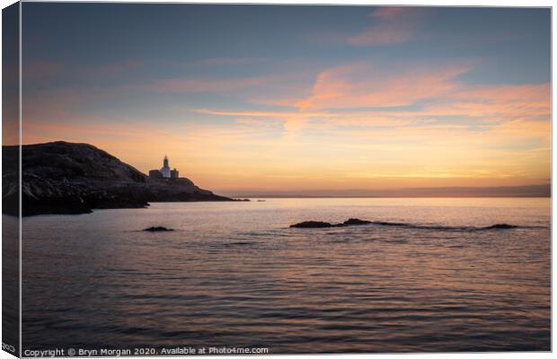 Mumbles lighthouse at sunrise Canvas Print by Bryn Morgan