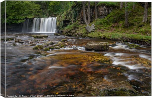 Sgwd Ddwli isaf, the lower gushing falls Canvas Print by Bryn Morgan