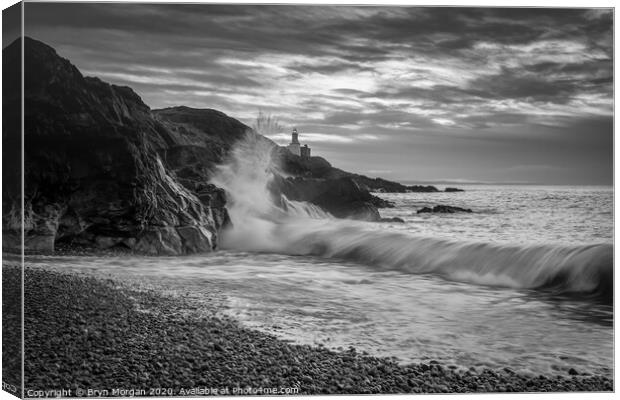 Mumbles lighthouse from Bracelet bay, black and white Canvas Print by Bryn Morgan