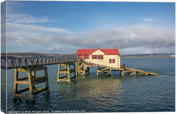 Mumbles pier with the old lifeboat house Canvas Print by Bryn Morgan