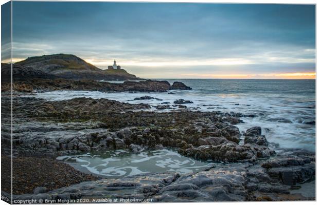 Mumbles lighthouse viewed from Bracelet bay Canvas Print by Bryn Morgan
