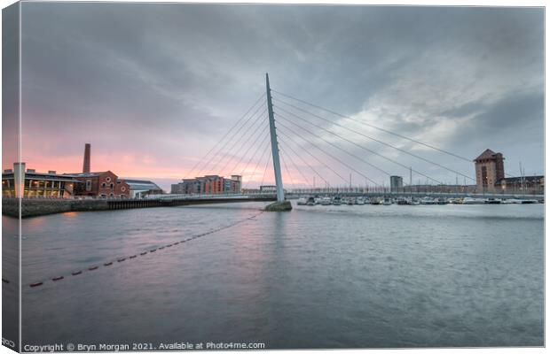Swansea marina sail bridge at sunrise Canvas Print by Bryn Morgan