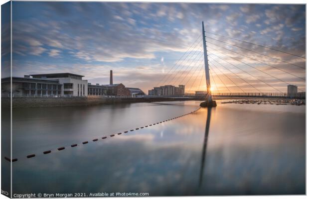 Swansea marina sail bridge at sunrise Canvas Print by Bryn Morgan