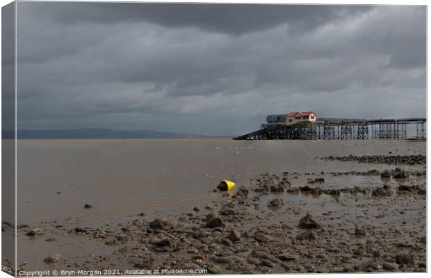 Mumbles pier at low tide Canvas Print by Bryn Morgan