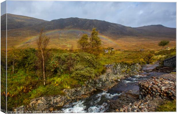 Rainbow in Glencoe, Scotland Canvas Print by Chris Dorney