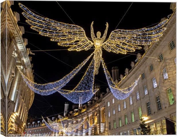Regent Street Christmas Lights in London, UK Canvas Print by Chris Dorney