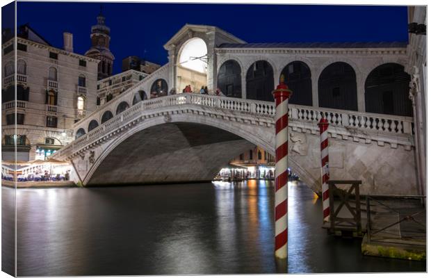 Rialto Bridge in Venice Canvas Print by Chris Dorney