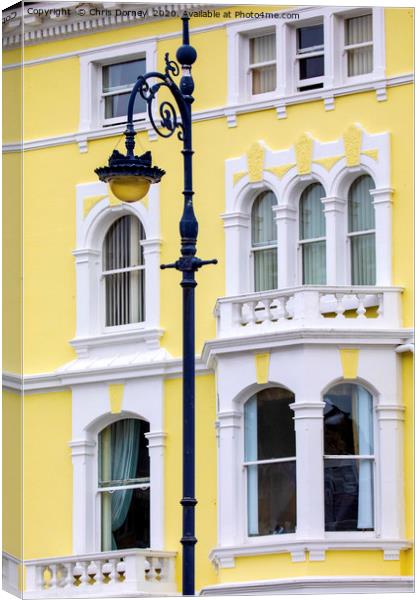 Vintage Lamp Post and Colourful Building in Llandu Canvas Print by Chris Dorney