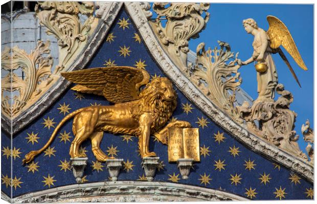 Sculpture of the Lion of Venice on St. Marks Basilica Canvas Print by Chris Dorney