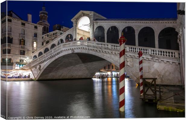 Rialto Bridge in Venice Canvas Print by Chris Dorney