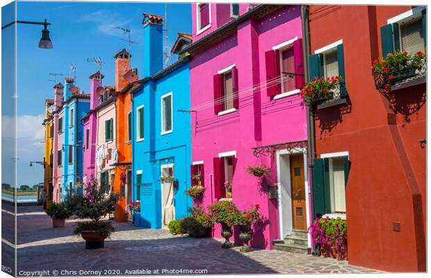 Burano in Italy Canvas Print by Chris Dorney