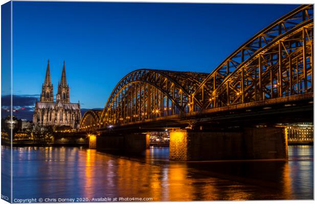 Cologne Cathedral and the Hohenzollern Bridge  Canvas Print by Chris Dorney