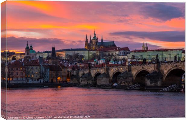 Prague Castle and the Charles Bridge Canvas Print by Chris Dorney