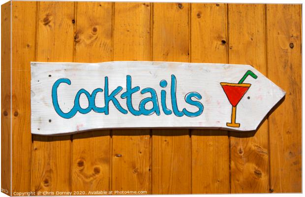 Cocktails Sign Canvas Print by Chris Dorney