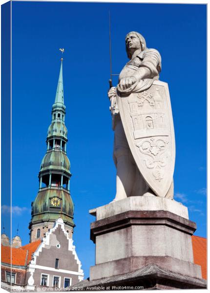 St. Roland Statue and St. Peter's Church in Riga Canvas Print by Chris Dorney