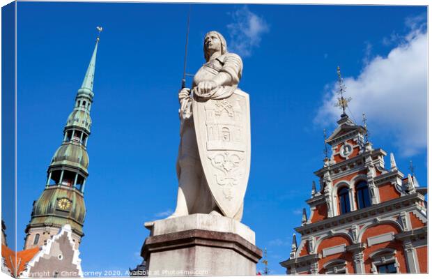 House of the Blackheads, St. Peter's Church and Saint Roland Statue in Riga Canvas Print by Chris Dorney