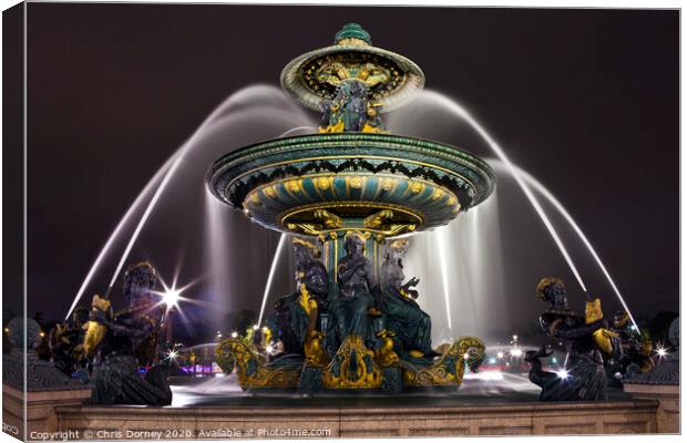 Fountain at Place de la Concorde in Paris Canvas Print by Chris Dorney