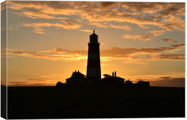 Sunset at Happisburgh Lighhouse Canvas Print by Sharon Breeze