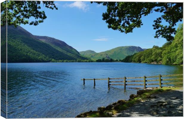 A Calm Day on Buttermere                          Canvas Print by John Iddles