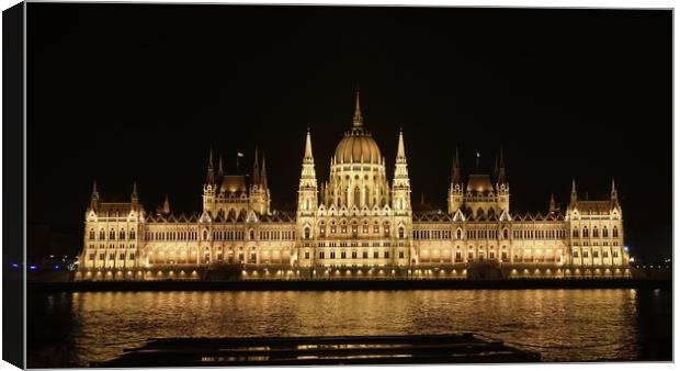 The Hungarian Parliament building at night         Canvas Print by John Iddles