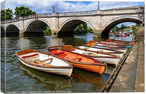Richmond Bridge and wooden row boats on the River  Canvas Print by Milton Cogheil