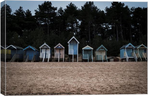 Beach Huts at Wells-next-the-Sea, Norfolk Canvas Print by Nichol Pope