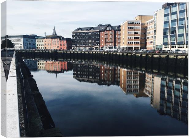 Riverside reflection in Cork City, Ireland Canvas Print by Jennifer Crowley