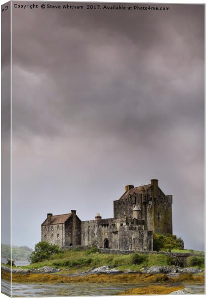 Storm clouds over Eilean Donan. Canvas Print by Steve Whitham