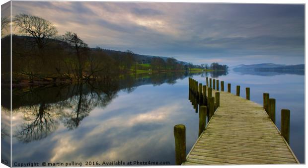 Calm before the storm on Coniston lake  Canvas Print by martin pulling