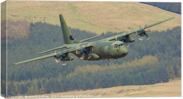 Hercules C-130  on the Mach loop Canvas Print by martin pulling