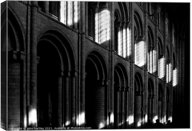 Listening in the Shadows-Ely Cathedral Canvas Print by john hartley