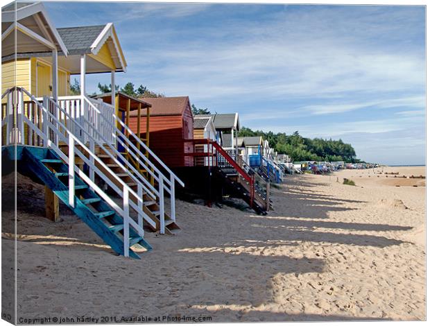 Holidays - Beach Huts Wells next the Sea North Nor Canvas Print by john hartley