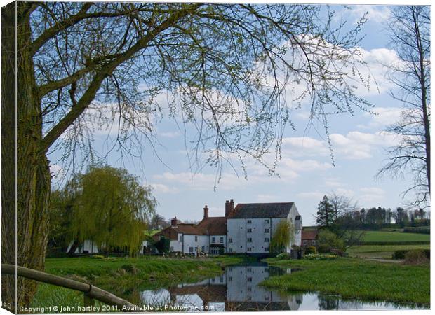 Old Water Mill on the River Wensum  Bintree Norfol Canvas Print by john hartley