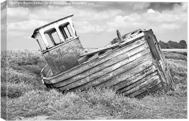 Derelict  Wooden Fishing Boat at Thornham North No Canvas Print by john hartley
